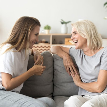 Ladies converse on couch
