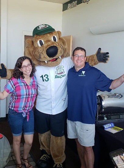 Team members with mascot