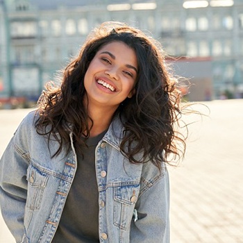 Lady smiles in parking lot
