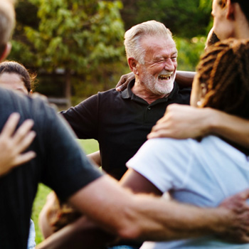 Chesterton patient enjoying community with confident smile