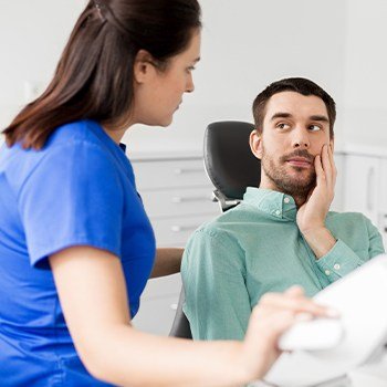 Man in pain at emergency dental visit