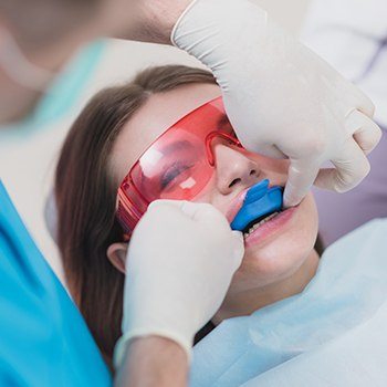 Child receiving fluoride treatment