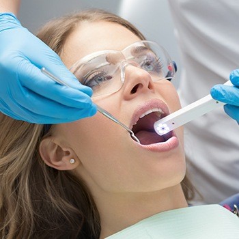 Dentist capturing intraoral images