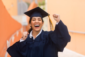 a person smiling after attending their graduation ceremony